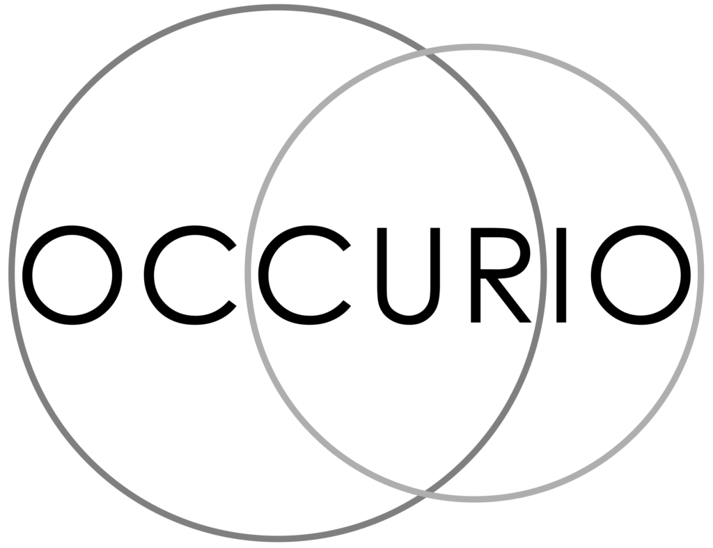 This is the logo for Occurio Solutions. There are two intersecting circles side-by-side with the word "Occurio" inside them in a black font. The circle on the left is dark gray and has the word "Occur" inside it. The circle on the right is slightly smaller, light gray, and has the letters "curio" inside it. The letters c, u, and r are in the intersection area of the two circles.